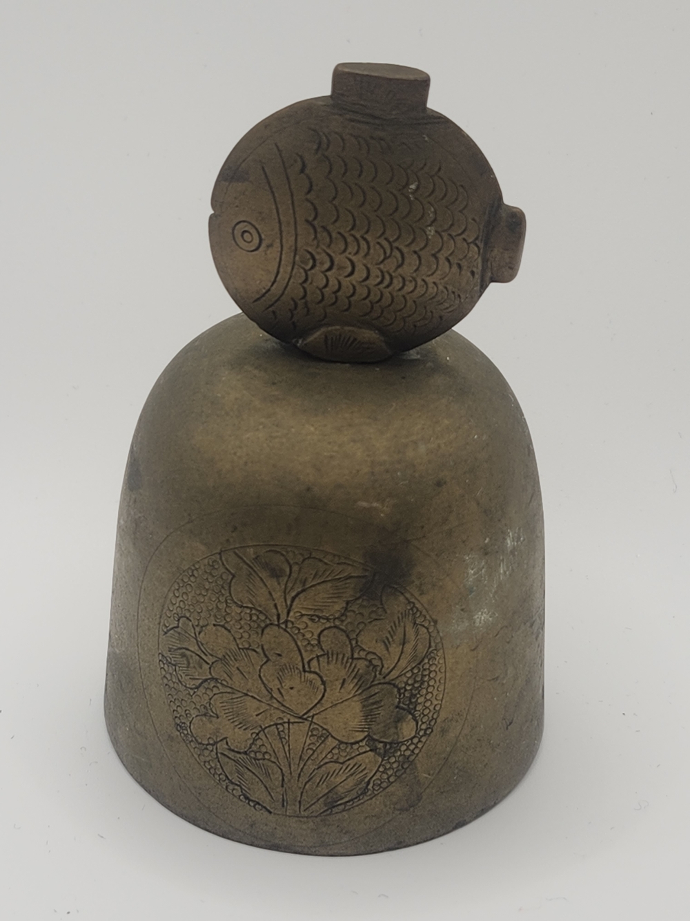 vintage Chinese brass dinner bell featuring a fish-shaped handle